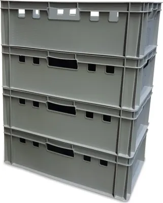 A stack of four gray plastic crates.
