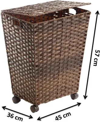 A brown wicker laundry basket with a lid and wheels, shown with dimensions indicated by measurement lines and text.