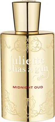 A gold perfume bottle with ornate detailing and the brand name "Juliette has a gun" and "MIDNIGHT OUD" printed on it.