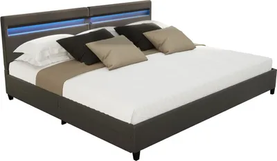 A dark gray upholstered bed with a built-in LED light strip on the headboard, shown with white and beige pillows and a white mattress.