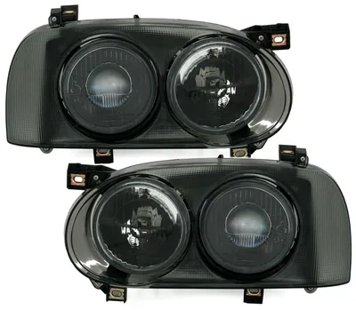Produktbild von Scheinwerfer schwarz DOKA Twin L/R mit Fadenkreuz für VW Golf 3 1991-1997