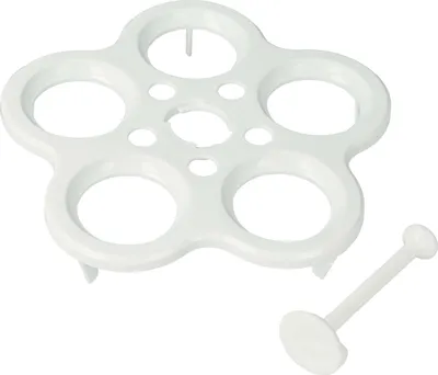 A white plastic egg holder with five circular slots and a separate white plunger-like accessory on a white background.