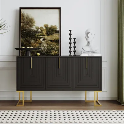 A dark gray sideboard with gold legs and handles, decorated with a painting, candle holders, and a bust sculpture.