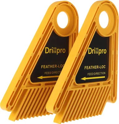 Two yellow featherboards for woodworking.