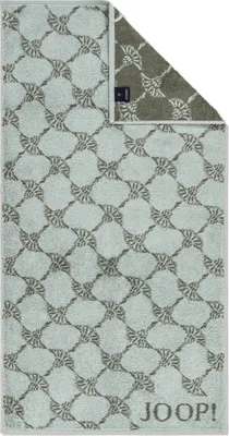 A folded towel with a patterned design.