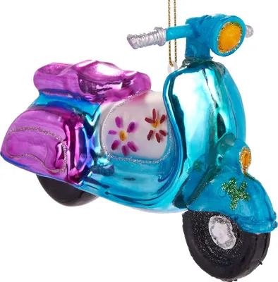 A close-up, studio shot of a decorative glass ornament shaped like a retro scooter.