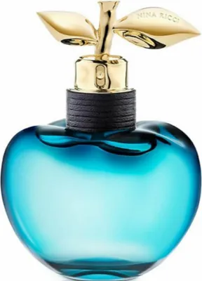 A blue apple-shaped perfume bottle with a gold stem and leaves.