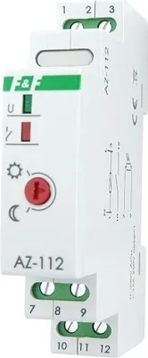 A close-up studio shot of a white electrical device with green and red accents.