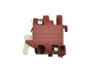 A close-up shot of a brown electrical switch component against a white background.
