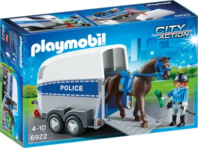 A Playmobil police trailer with a horse and a police officer on a green field with a city skyline in the background.