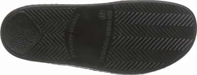 The underside of a black shoe sole.