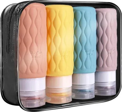 Produktbild von Famanu Reiseflaschen Set 100 ml – Silikonflaschen mit transparenter Toilettasche