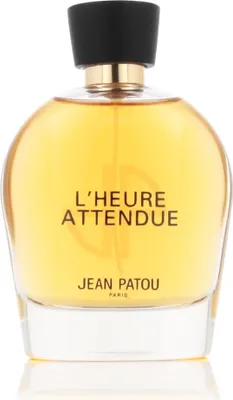 A perfume bottle with a gold cap and yellow liquid inside, set against a white background.