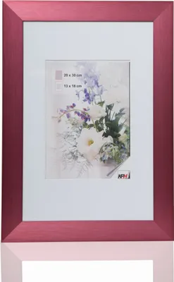 A framed picture with a floral image inside, placed on a white surface with a reflection.