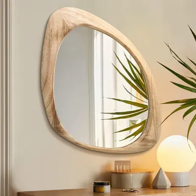 Image de Miroir mural, forme irrégulière, 60x40 cm, cadre en bois, finition naturelle, décoratif, idéal pour le salon ou la salle de bain