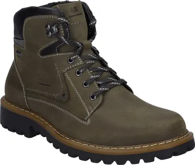 A single green boot is shown against a white background.