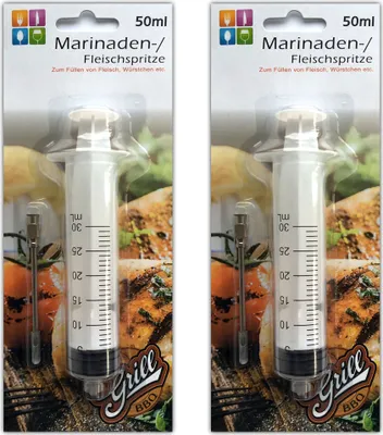Two packages of meat injectors are shown side-by-side.