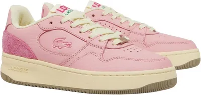 A pair of pink Lacoste sneakers on a white background.