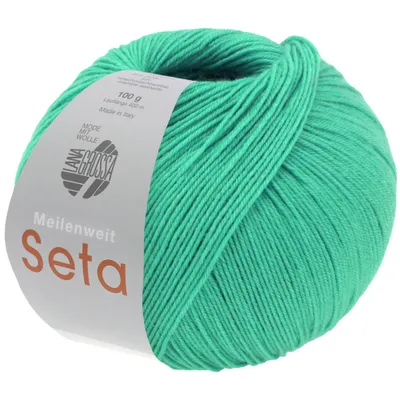 A ball of green yarn with a label.