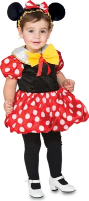A young child wearing a Minnie Mouse costume.