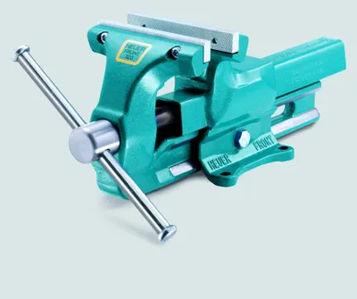 A teal colored metal vise is shown against a light gray background.