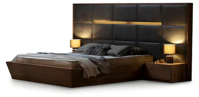 Productafbeelding van Het hoge, stijlvolle bed is voorzien van elegante stoffen.
