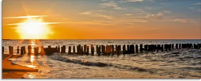 Produktbild von ARTland Glasbild Schöner Sonnenuntergang am Strand Größe: 125x50 cm