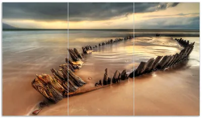 Produktbild von Wallario Herdabdeckplatte aus Glas, Größe 90 x 52 cm 3-teilig, Motiv Bootswrack in Irland am Strand
