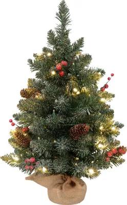 A decorated artificial Christmas tree on a white background.