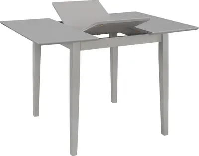 A light gray extendable dining table is shown against a white background.
