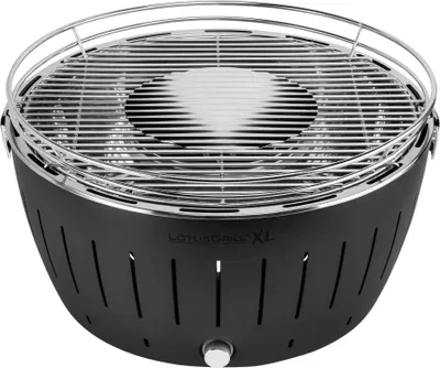 A black charcoal grill with a silver grill grate.