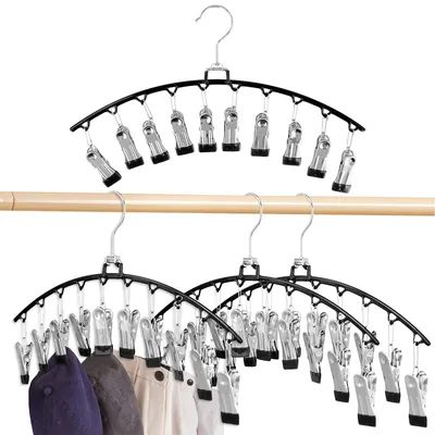 Produktbild von Set mit 4 platzsparenden Hosenbügeln mit Clips