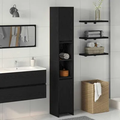 A bathroom scene with a black vanity, sink, mirror, tall cabinet, and shelves.