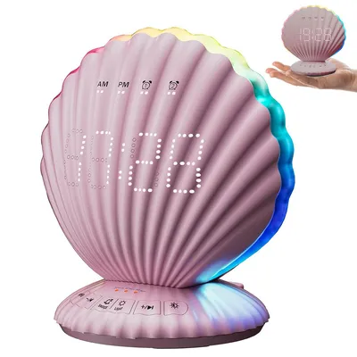 A pink seashell-shaped alarm clock with a digital display and RGB lighting.