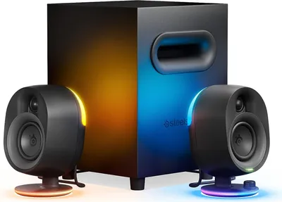 A black 2.1 speaker set with a subwoofer and two satellite speakers, illuminated with colorful LED lights.