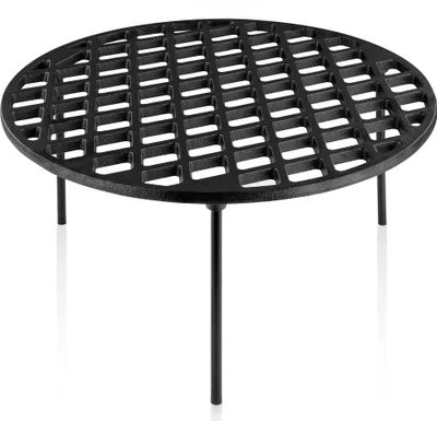 A black cast iron grill grate with three legs, shown from a slightly elevated side angle against a white background.