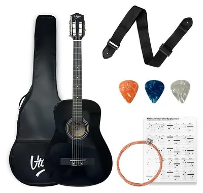 Image de Guitare classique V-TONE CG ONE BK, noire, taille 4/4, idéale pour les débutants. Livrée avec un médiator, une sangle, des cordes de rechange, une housse et un guide d'accords