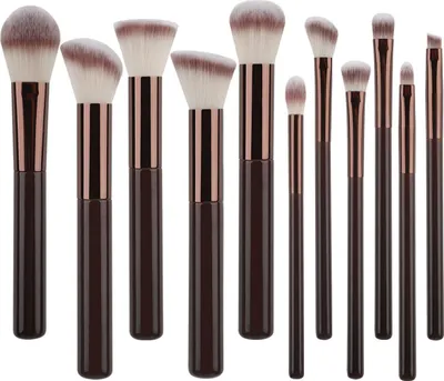 A set of makeup brushes arranged on a white background.