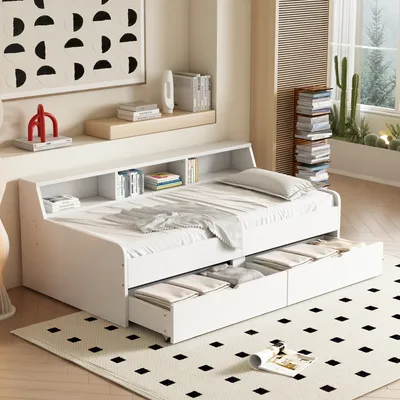 A white bed with drawers and a shelf in a room.