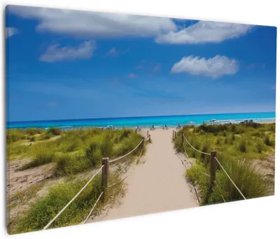 Produktbild von Wallario Premium Leinwandbild Sandweg zum blauen Meer mit blauem Himmel in Größe 60 x 90 cm