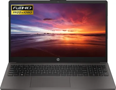 A black HP laptop is shown from the front with its screen displaying a colorful sunset over a beach.