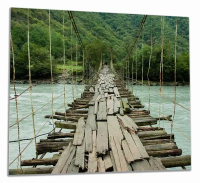 Produktbild von Wallario Herdabdeckplatte aus Glas, Größe 60 x 52 cm 1-teilig, Motiv Alte Hängebrücke über dem Fluss