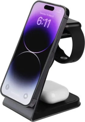 A black charging stand holding a smartphone, smartwatch, and wireless earbuds.