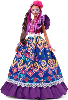 A Barbie doll dressed in a traditional Mexican outfit, likely for Día de Muertos celebrations.