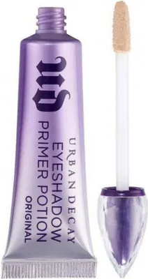 A tube of Urban Decay Eyeshadow Primer Potion with its applicator wand.