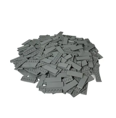 A pile of gray LEGO tiles on a white background.