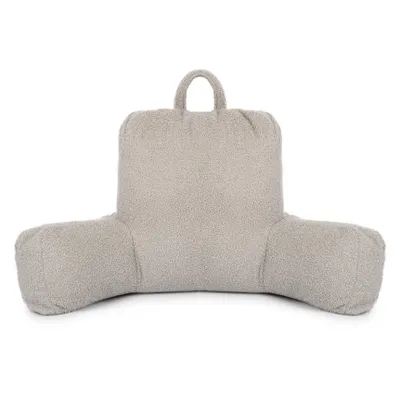 A light gray reading pillow with armrests and a handle on a white background.