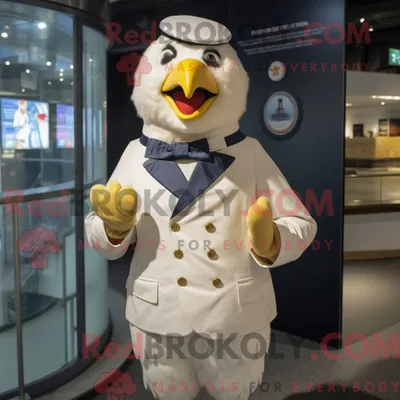 Zdjęcie produktu dla Maskotkarakter REDBROKOLY av en kremkylling kledd med en kamizelka og mansjettknapper