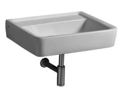 A white ceramic sink with a chrome drainpipe is shown against a white background.