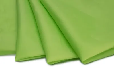 Zdjęcie produktu dla Materiał obiciowy z poliestru, lekko prześwitujący, kolor seledynowy, wymiary 50 x 150 cm